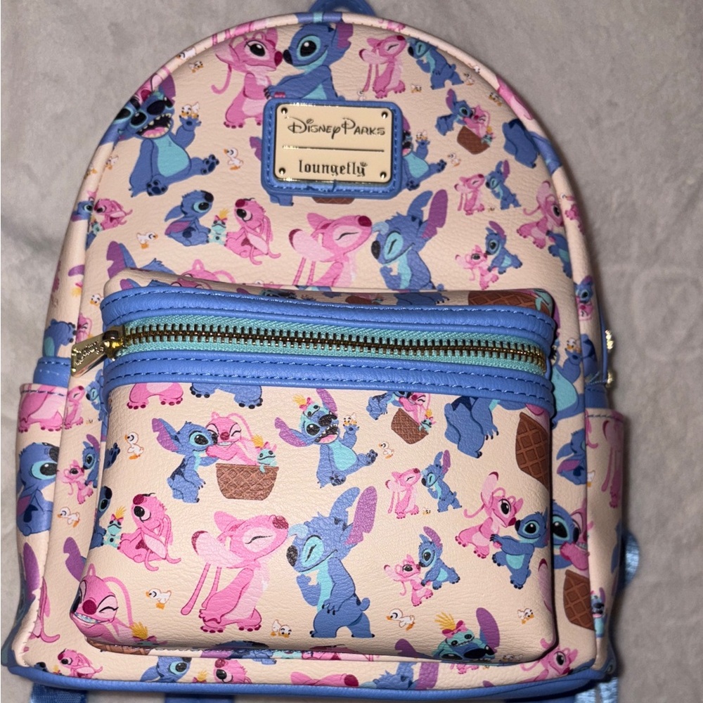 Loungefly Disney Parks Lilo and stitch Blue and Pink Stitch Pattern backpack